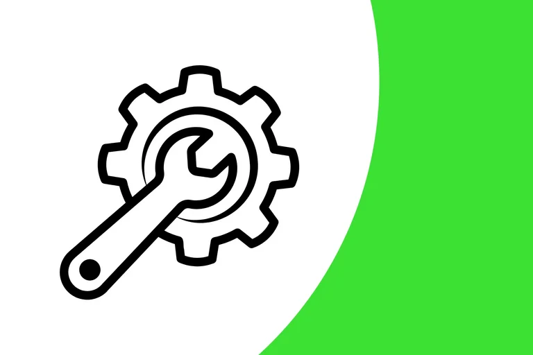 Die Grafik zeigt ein Zahnrad und einen Schraubenschlüssel an, die für technische Arbeiten stehen